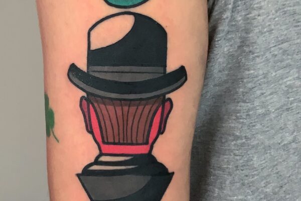 Pietro-Buccinnà-Solid-traditional-tattoo-magritte